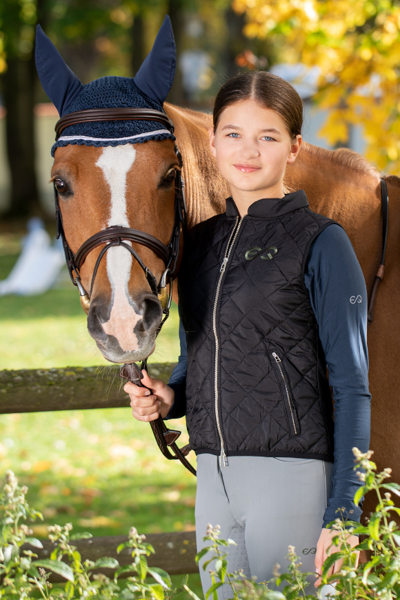 QUILTED VEST WITH STRETCHY BACK